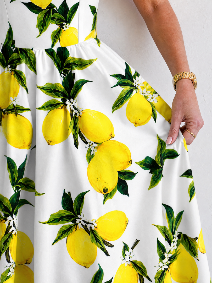 NORIA | Vestido de largo medio sin mangas con estampado de limones