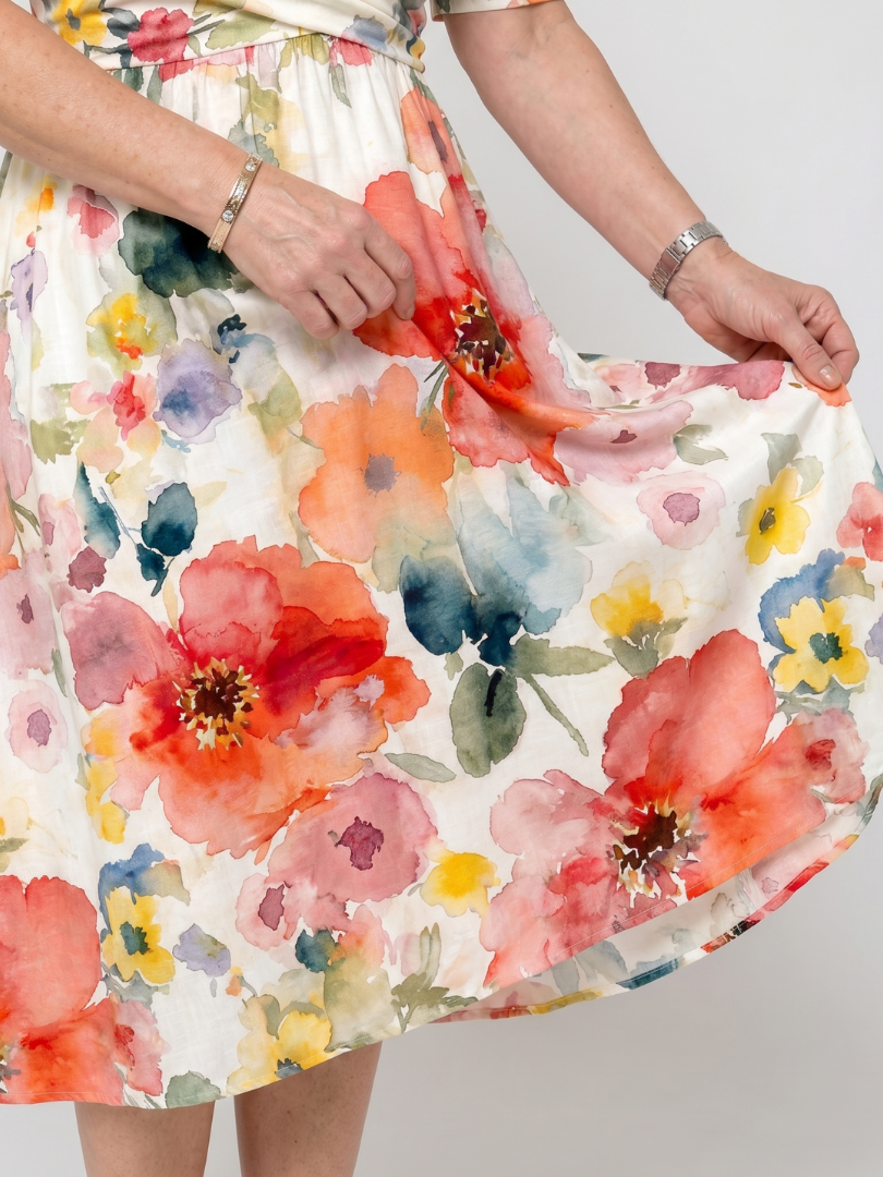 NORIA | Vestido de largo medio de manga corta con estampado floral y escote en V