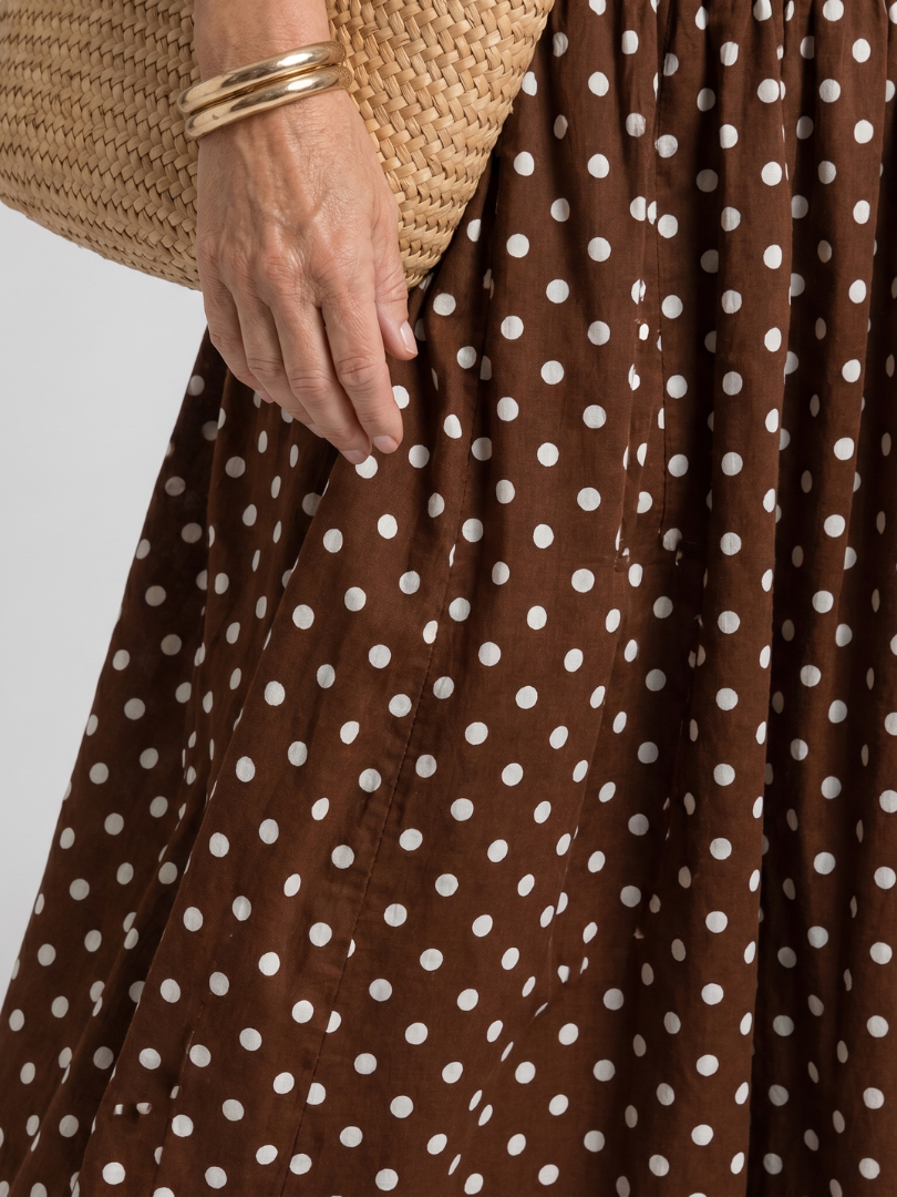 NORIA | Vestido de largo medio sin tirantes con estampado de lunares
