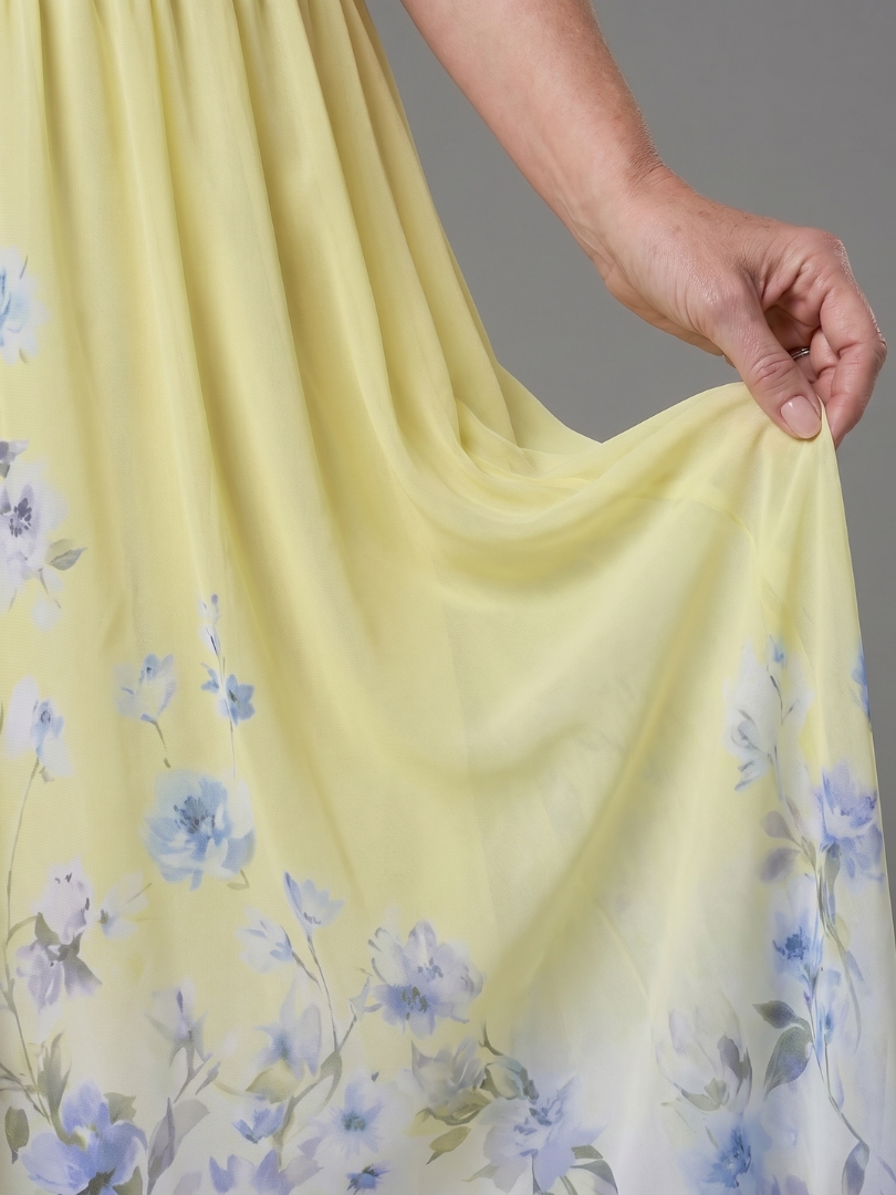 NORIA | Vestido de largo medio sin mangas con escote en V y bajo floral