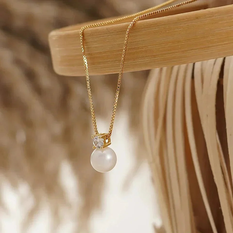 NORIA | Colgante con perla